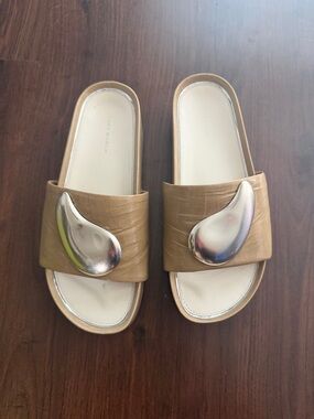 Tory Burch Tan Slide Sandals with Sculpted Silver Accent